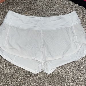 lulu speed ups sz6 2.5. tiniest flaw inside the band, and inside the back pocket